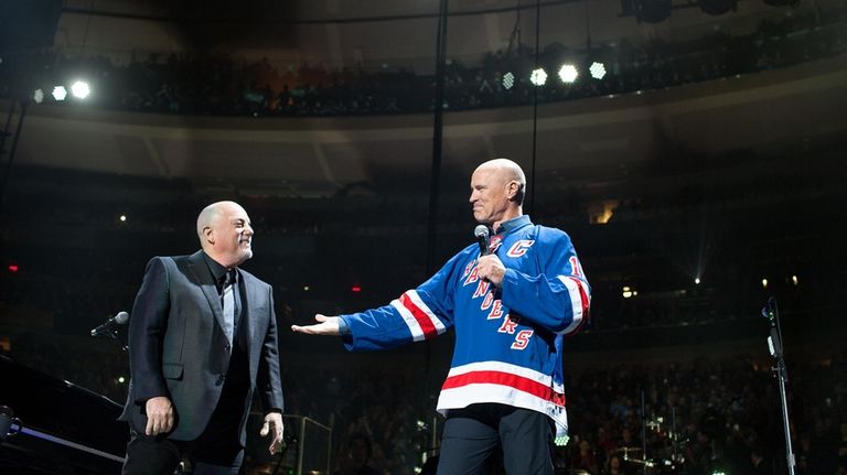 Old-time hockey: Rangers great Mark Messier greets Joel at his...