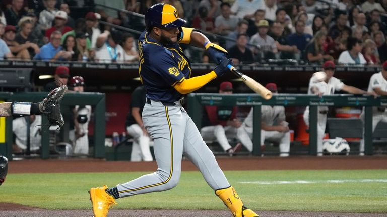 Milwaukee Brewers' Jackson Chourio hits a double against the Arizona...