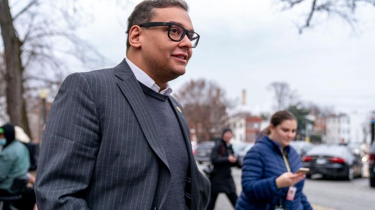 Rep. George Santos (R-Nassau/Queens) leaves a House GOP conference meeting...