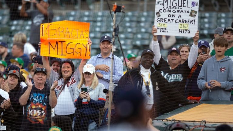 Detroit Tigers fans acknowledge Miguel Cabrera after a presentation by...