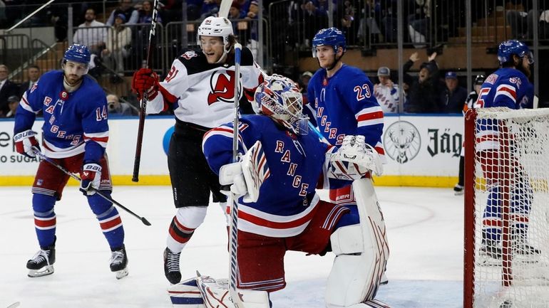 Igor Shesterkin #31 of the Rangers surrenders the overtime goal...