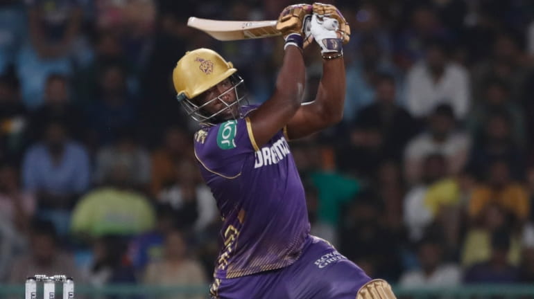 Kolkata Knight Riders' Andre Russell plays a shot during the...