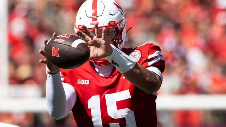 Nebraska's Dylan Raiola (15) takes a snap during the first...