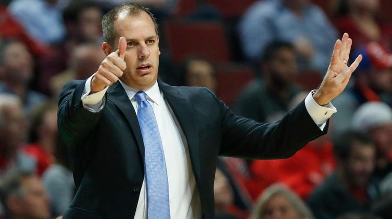 Orlando Magic head coach Frank Vogel directs his team against...