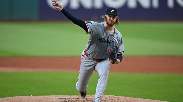 Minnesota Twins starting pitcher Bailey Ober delivers during the first...