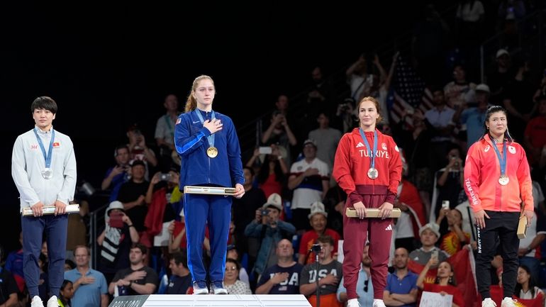 Medalists, from left, Kyrgyzstan's Meerim Zhumanazarova, silver, United State's Amit...