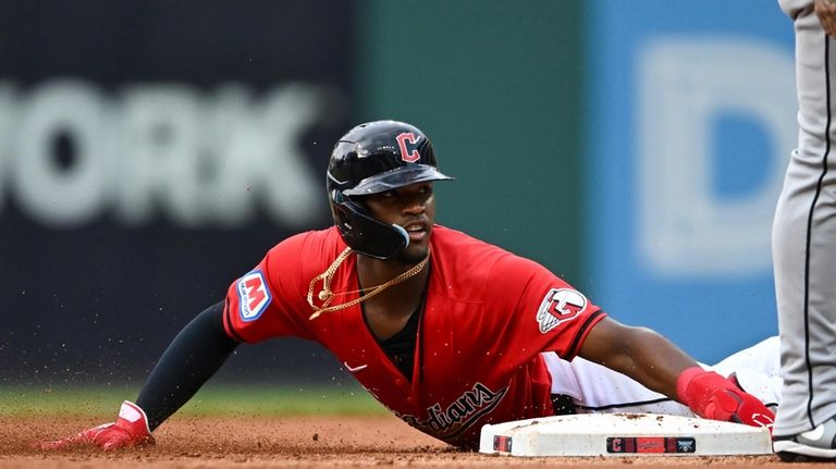 Cleveland Guardians' Angel Martínez steals second base during the fourth...