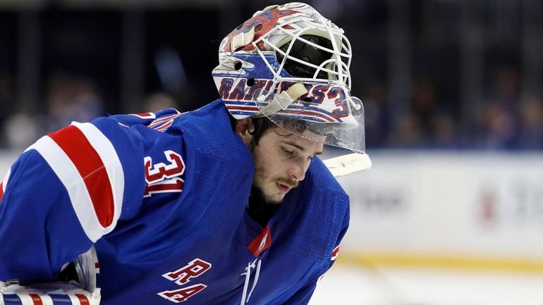 Igor Shesterkin of the Rangers looks on during the second period against...