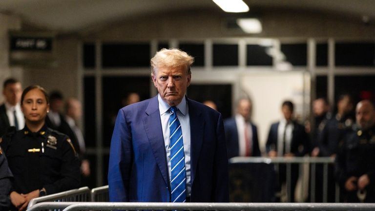 Former President Donald Trump addresses the media following the second...