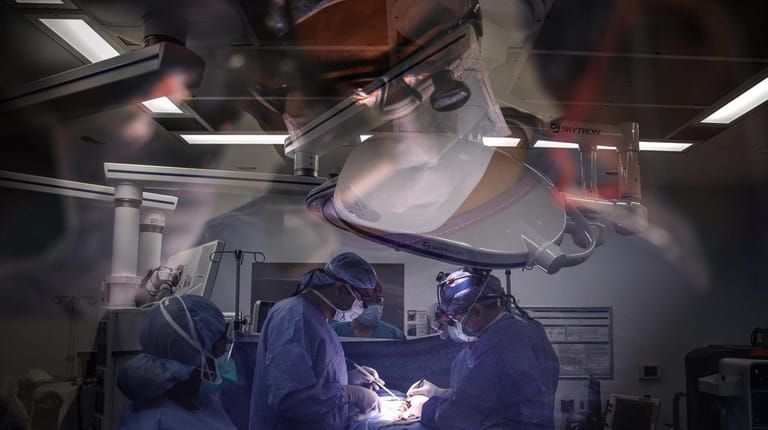 A double exposure of operating room 14 at Mount Sinai...