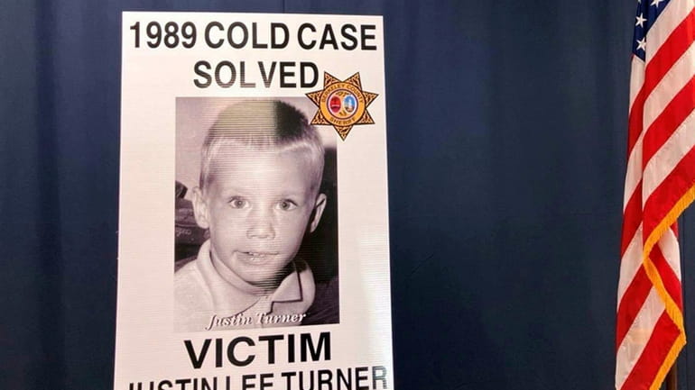 An image of victim Justin Lee Turner is displayed during...