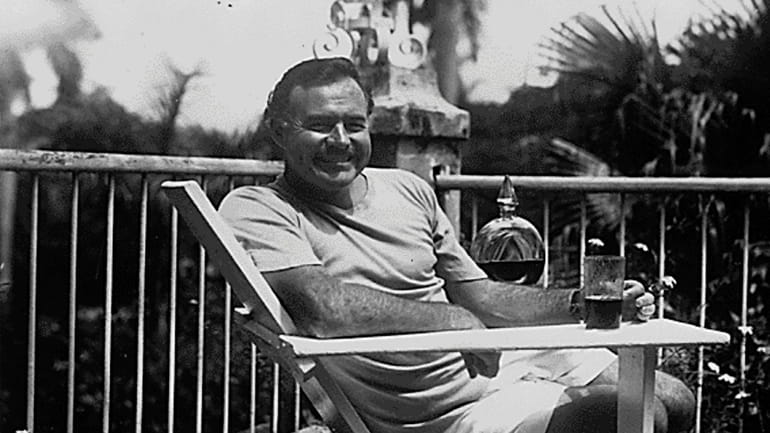 Ernest Hemingway, at his home in Cuba, Finca Vigía, where he wrote...