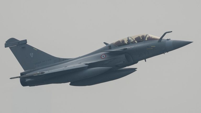 France's Rafale fighter jet performs during visiting Indonesia on the...