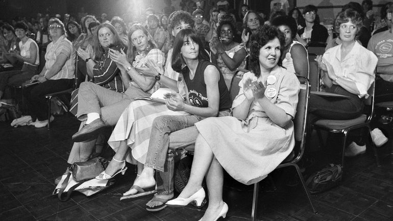 Coal Employment Project Founder Betty Jean Hall, front right, applauds...