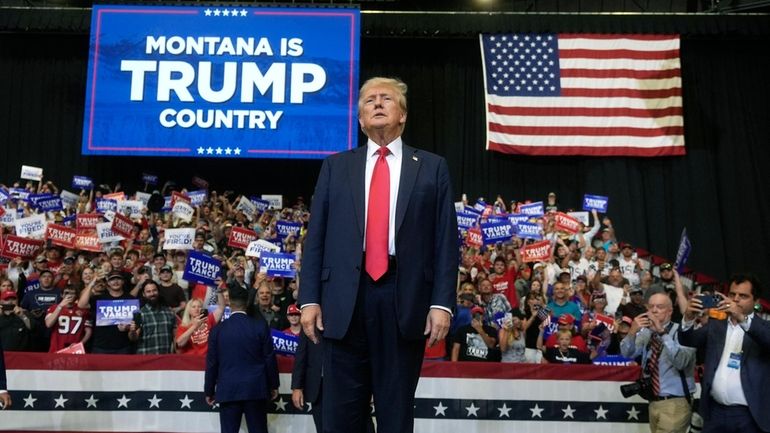 Republican presidential nominee former President Donald Trump arrives for a...