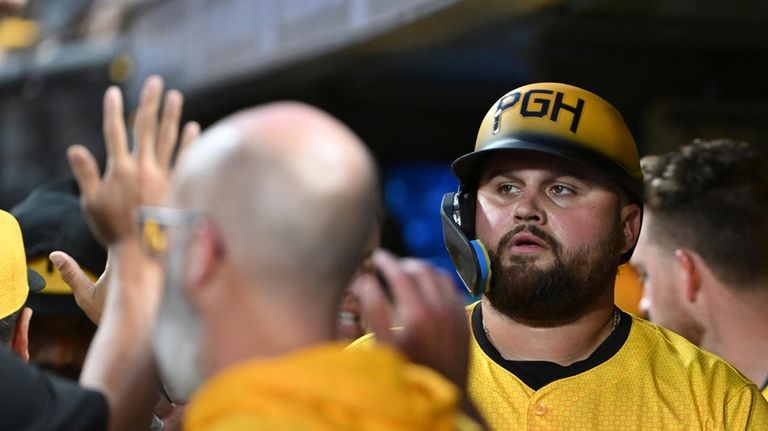 Pittsburgh Pirates first base Rowdy Tellez celebrates after scoring against...