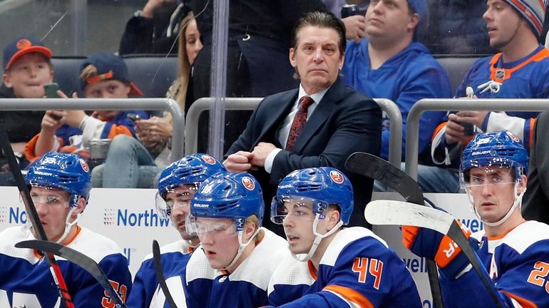 Head coach Lane Lambert of the Islanders looks on during the...