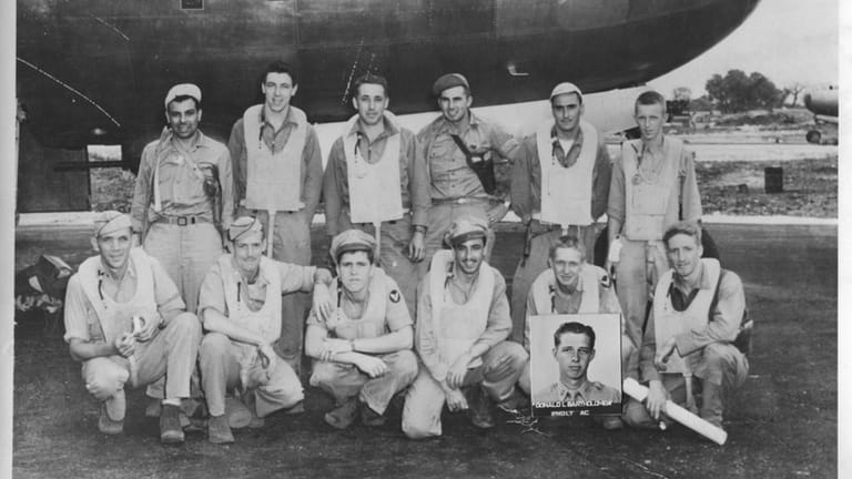 Group photo of the B-29 crew shows Sgt. Henry L....