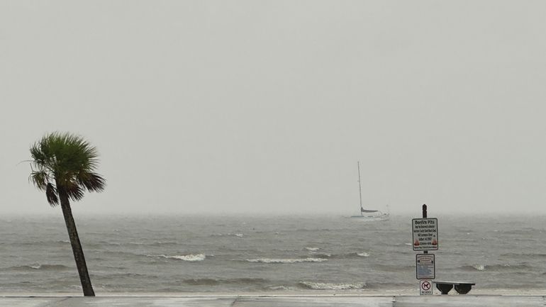 Winds and heavy downpour on Harrison County Beaches in Pass...