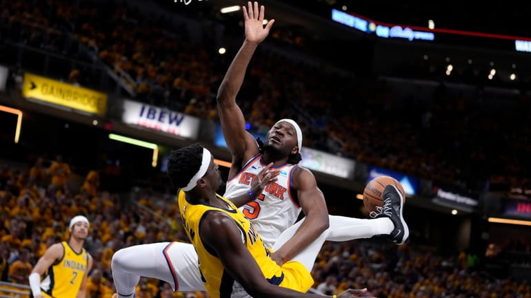 Indiana Pacers forward Pascal Siakam blocks a shot by Knicks...