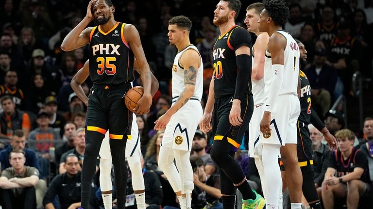 Phoenix Suns forward Kevin Durant (35) reacts after a foul...