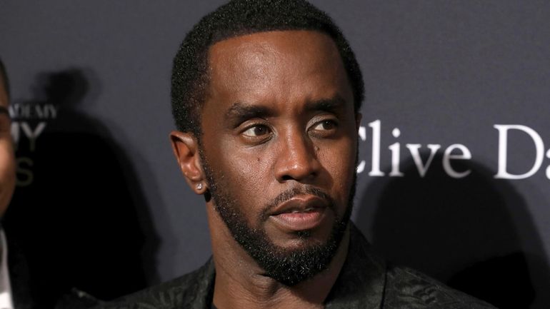 Sean Combs arrives at the Pre-Grammy Gala And Salute To...