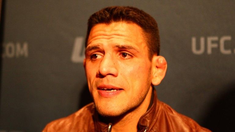 UFC lightweight champion Rafael dos Anjos answers questions from the...