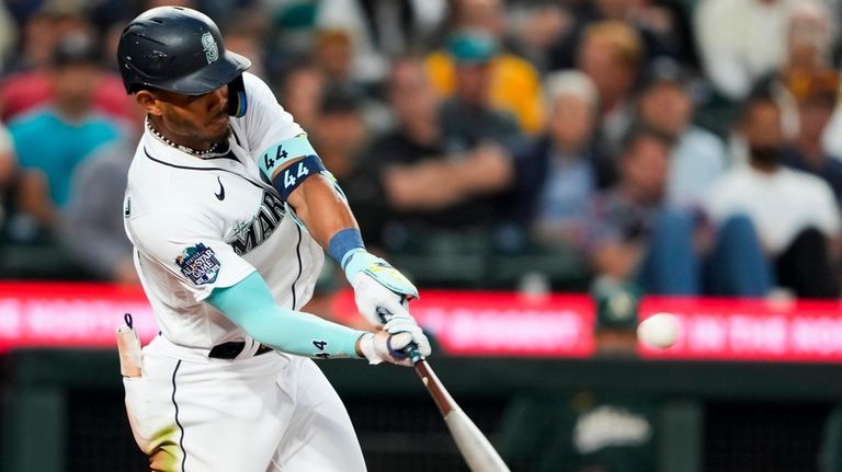 Julio Rodriguez's big night sparks offensive outburst in Mariners' 9-7 win  over Angels