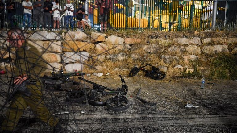 Destroyed children's bicycles at the site of a rocket attack...