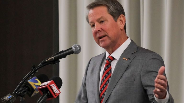 Georgia Gov. Brian Kemp speaks to the attendees at the...