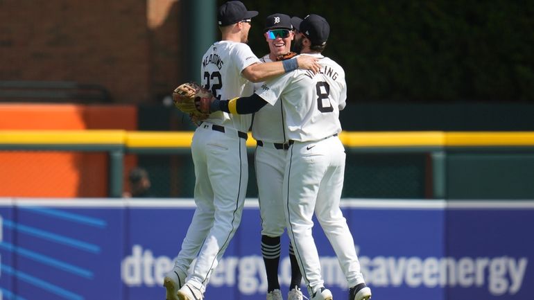 Detroit Tigers' Parker Meadows, from left, Kerry Carpenter and Matt...