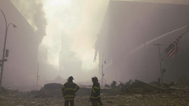 Emergency workers at Ground Zero after the September 11, 2001 terror attacks on...