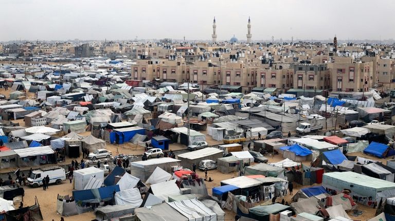 A tent camp housing Palestinians displaced by the Israeli offensive...