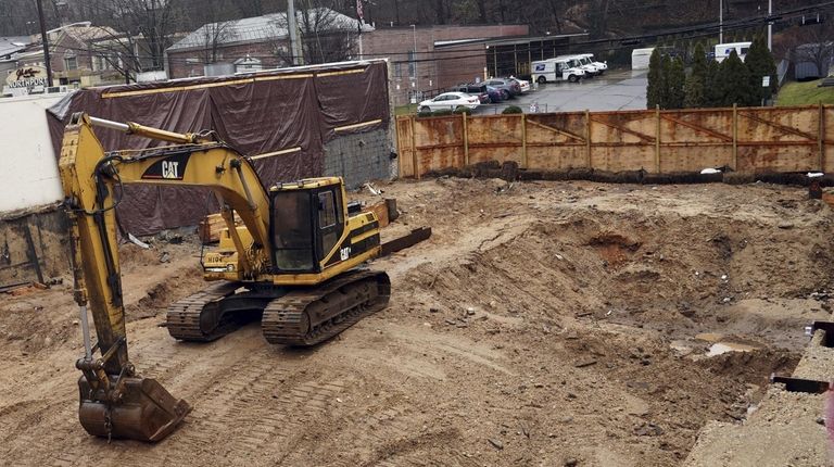 A building was demolished on Main Street in Northport to make...