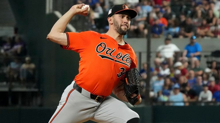 Baltimore Orioles starting pitcher Grayson Rodriguez works against the Texas...