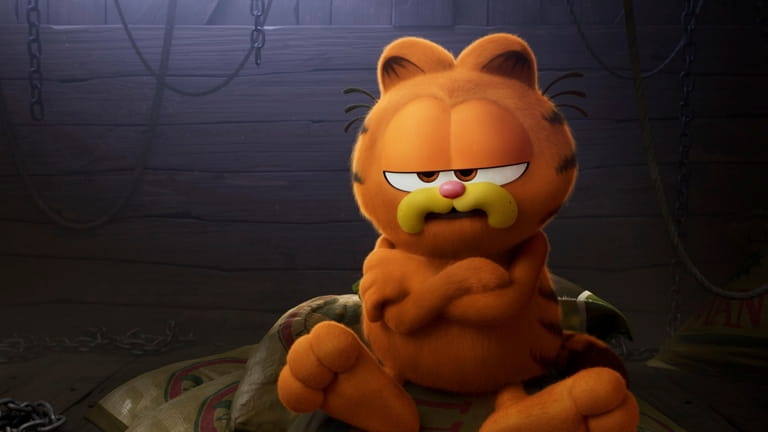 This image released by Sony Pictures shows Garfield, voiced by...