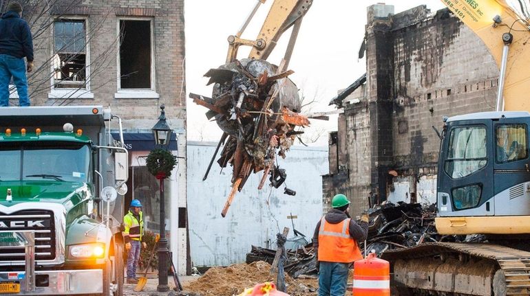 The remains of the Compass real estate building are removed...