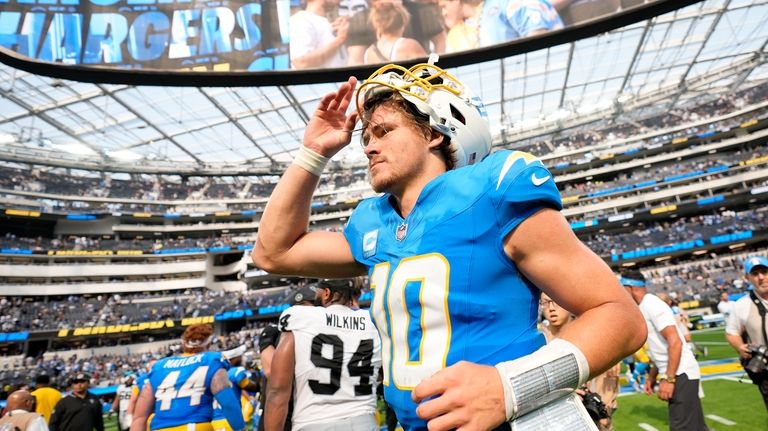 Los Angeles Chargers defensive tackle Scott Matlock walks off the...