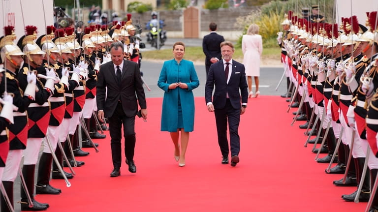 Danish Premier Mette Frederiksen arrives at the international ceremony at...