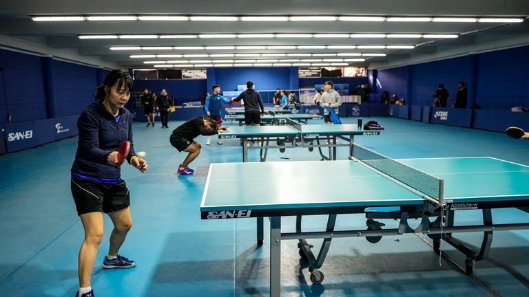 Table tennis player Zhiying Zeng trains at the National Olympic...