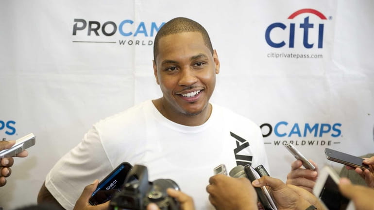 Carmelo Anthony of the Knicks speaks to the media after...