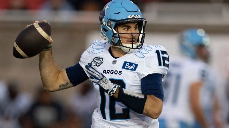 Toronto Argonauts quarterback Chad Kelly (12) throws against the Montreal...