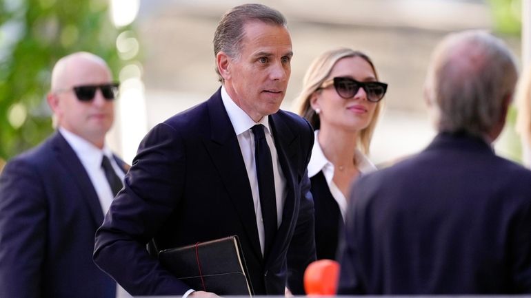 Hunter Biden arrives to federal court with his wife, Melissa...