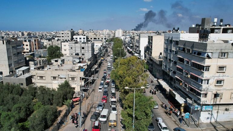 Palestinians fleeing from northern Gaza to the south after the...