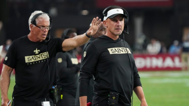 New Orleans Saints head coach Dennis Allen watches from the...