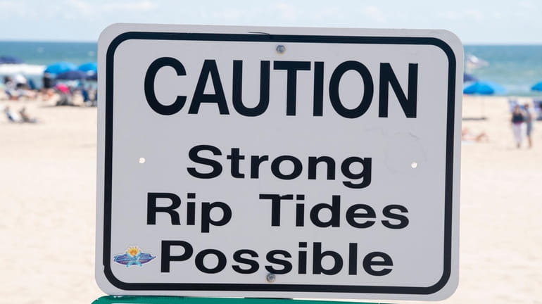 A rip current sign at Cooper's Beach in Southampton this past...