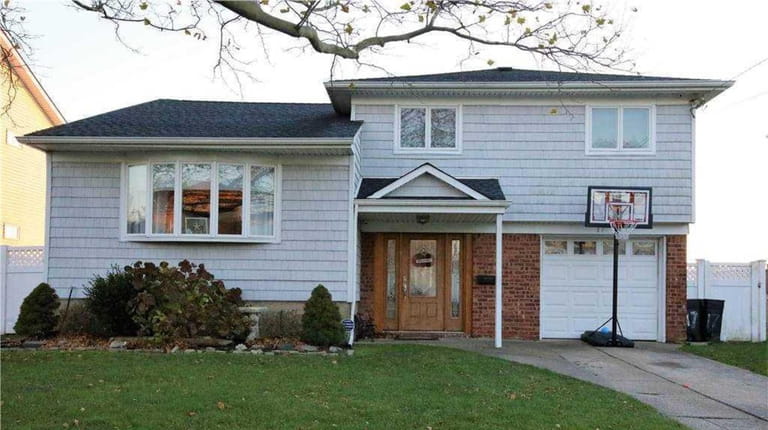 Priced at $689,000, this three-bedroom, two-bathroom split-level on  Arden Road...