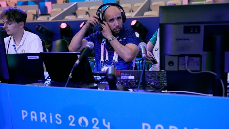 Nacer Eddine Zorgani prepares for the night's boxing matches at...