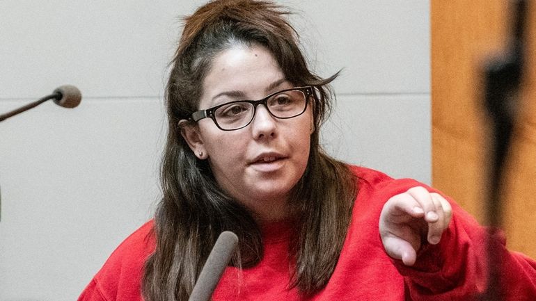 Kayla Montgomery gestures while testifying during the trial of Adam...