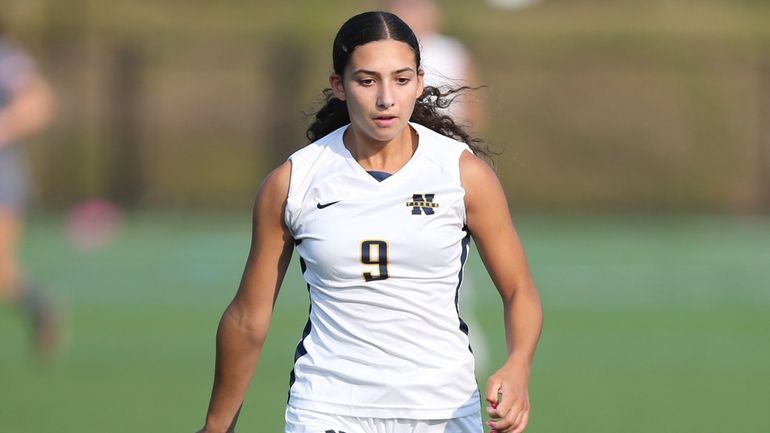 Northport's Sammy DeNisco moves the ball upfield in the second...